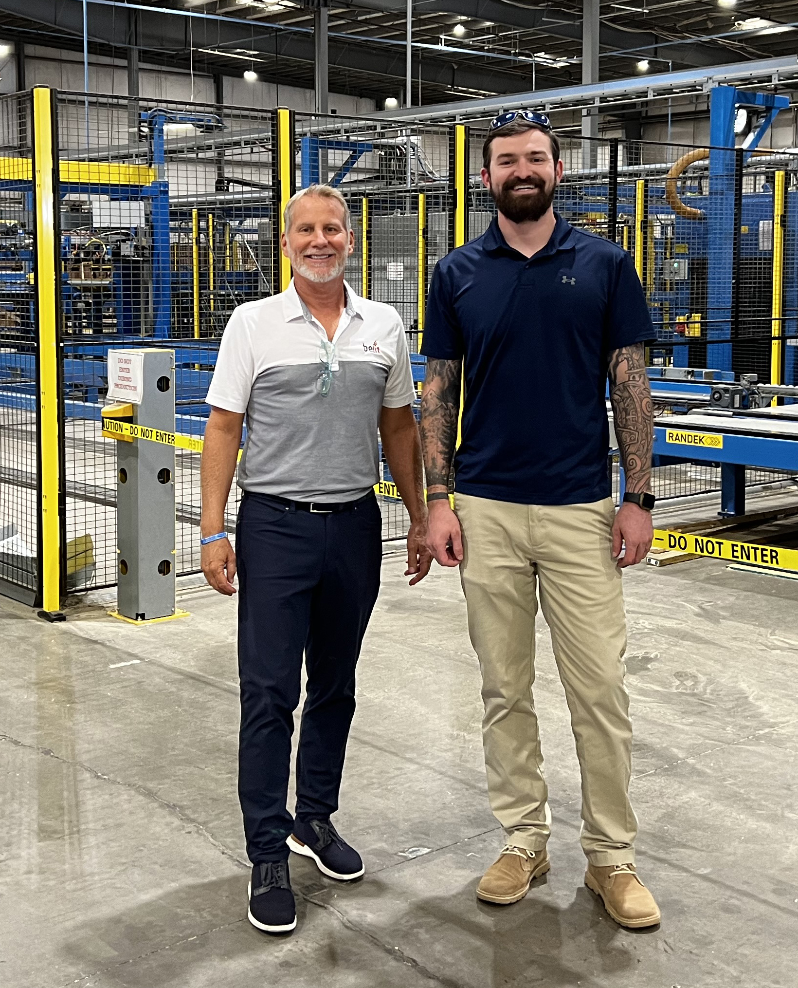 Barry Dixon and Bradford Bowen inside Service Offsite Solutions manufacturing plant